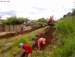 Maintenance team reopening drainage channels